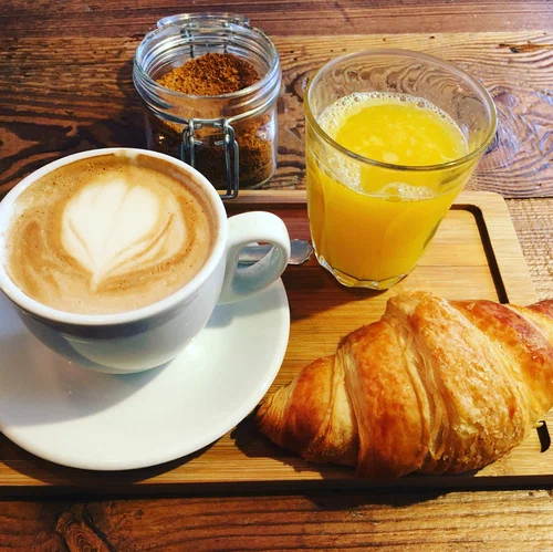 The Coffee House Barcelona signature dishes Avocado ToastPancakes with FruitEggs BenedictSpecialty Coffee Drinks